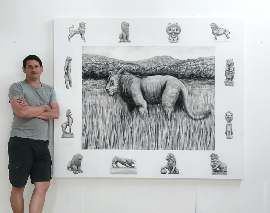 Tom Van Herrewege standing with The Lion, 2023.